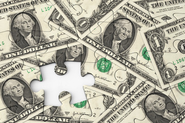 Dollar bank notes with jigsaw puzzle effect.