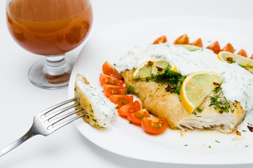 grilled fish with vegetables and cream sauce