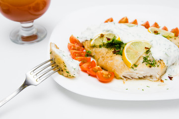 grilled fish with vegetables and cream sauce