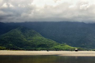 Cloudy morning  in asia mouuntains near the lake