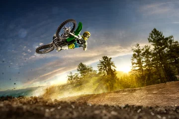 Rolgordijnen Dirt bike rider is flying high © 103tnn