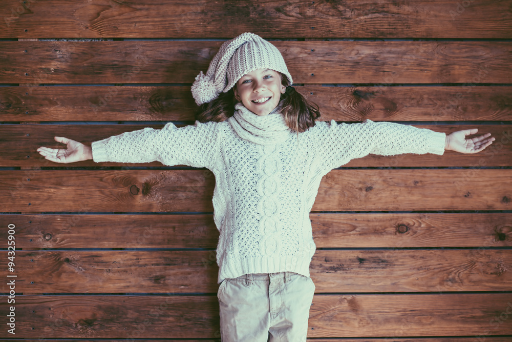 Poster child posing in knitted clothing