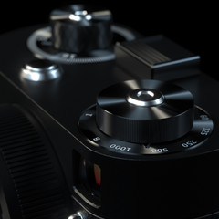 Vintage camera in black studio setup control wheels view 2 (this