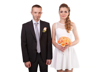 Young wedding couple isolated on white