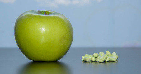 vitamins to choose an apple or pills