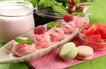 Watermelon ice cream in bowl  on color wooden background