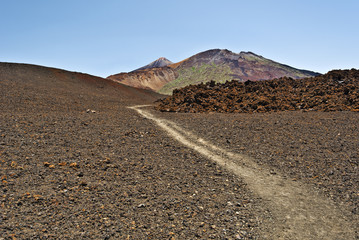 Fototapeta na wymiar Hiking pass to Craters of Pico Viejo in Tenerife Island