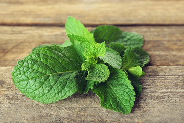 Bunch of mint on wooden background