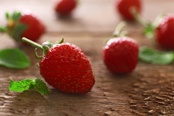 Sweet strawberry on wooden background