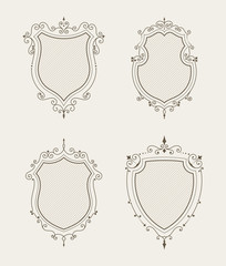 Set of luxury premium stylish templates in the form of a decorative medieval heraldic shields. Hotel, boutique, jewelry sign. Wedding, invitation, logo design. Borders, frames, labels in retro style.