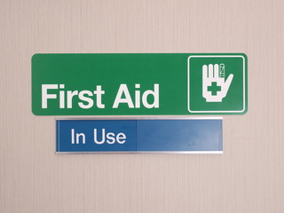 First aid door sign with occupied indicator at an industrial first aid room, Melbourne 2015
