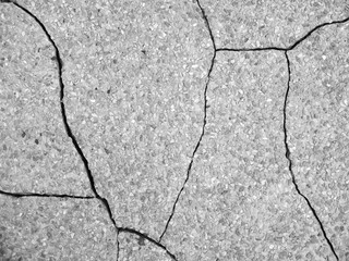 Obraz premium Crack on the gray stone background