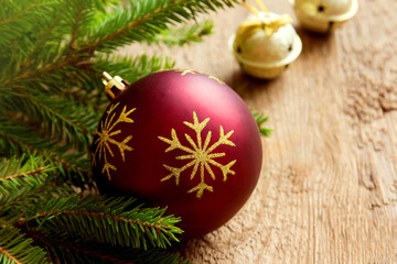 Fototapeta na wymiar Red Christmas ball with fir