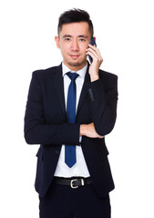 Asian young Businessman chat on mobile phone