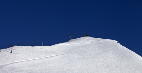 Panoramic view on ski slope and ropeway