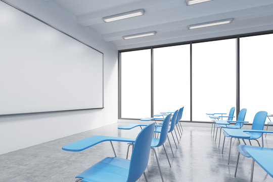 A classroom or presentation room in a modern university or fancy office. Blue chairs, a whiteboard on the wall and panoramic windows with white copy space. 3D rendering.