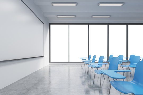 A classroom or presentation room in a modern university or fancy office. Blue chairs, a whiteboard on the wall and panoramic windows with white copy space. 3D rendering.