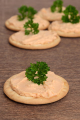 salmon pate crackers with parsley