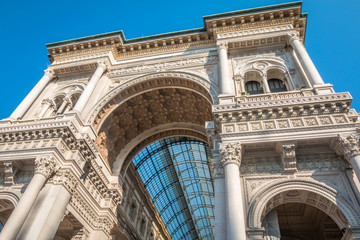 Obraz premium The Facade of Vittorio Emanuele II Gallery in Milan, Italy