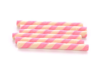 Colorful waffle striped rolls on white background