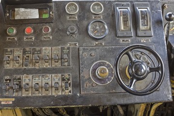 steering wheel, switchboard and controlboard in an old train