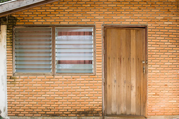 Fototapeta na wymiar old wall, door and window of front house