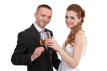 Young wedding couple with champagne glasses