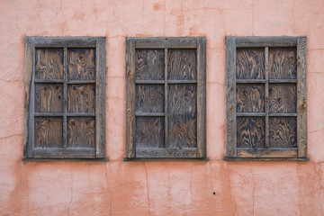 Pink clay wall of old house