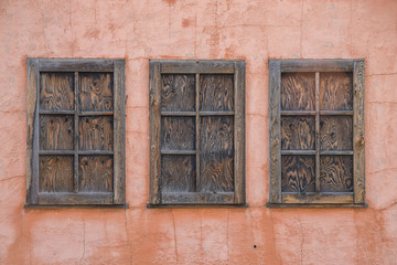 Pink clay wall of old house