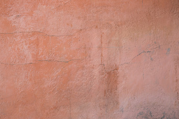 Pink clay wall of old house