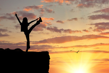 Silhouette of a happy woman