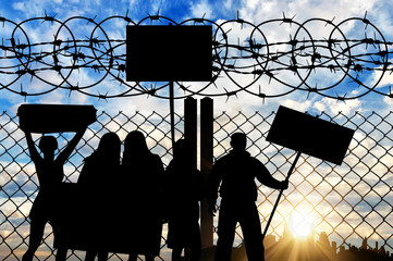  Silhouette protesters refugees