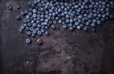 Blueberries on a dark background.Copy space for your text. Healthy food.selective focus