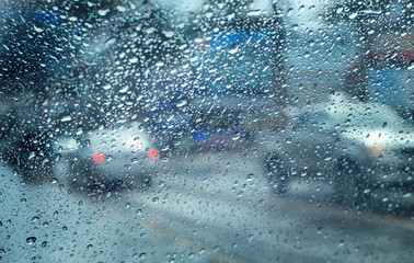 Heavy rush hour traffic in the rain,View through the window.