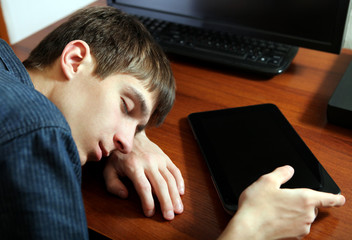 Man sleep with Tablet Computer