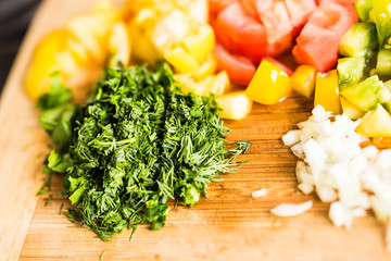 fresh chopped vegetables on a cutting  board