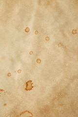 Paper with blots of coffee