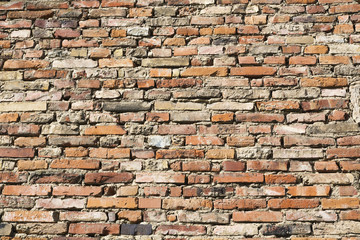 Obraz premium old brick wall inlaid regularly