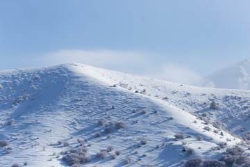 snowy mountains of Tien Shan mountains in winter