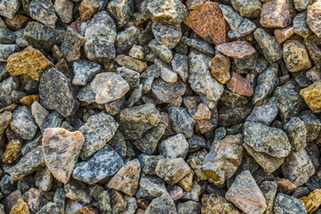 Crushed stone.
Natural granite gravel used for construction. Clean the surface of stones washed by rain.