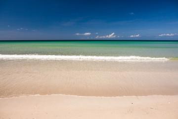 Paradise sand beach on sunny day