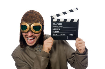 Pilot holding movie clapboard on white