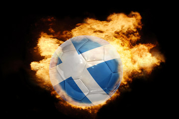 Fototapeta premium football ball with the flag of scotland on fire