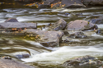 Fototapeta na wymiar Stream and Rocks in Autumn - Ontario, Canada