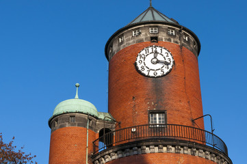 Old brick tower with a clock