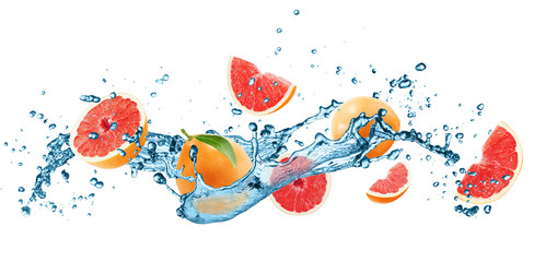 grapefruets in water splash isolated on the white background