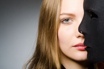 Woman with mask in funny concept