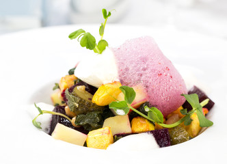 vegetable salad and pumpkin on a table in a restaurant
