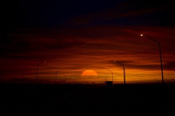 Fototapeta na wymiar Morning red sunrise and re sky