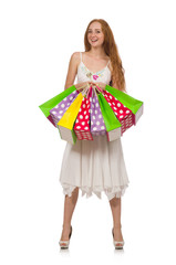 Woman with shopping bags isolated on white